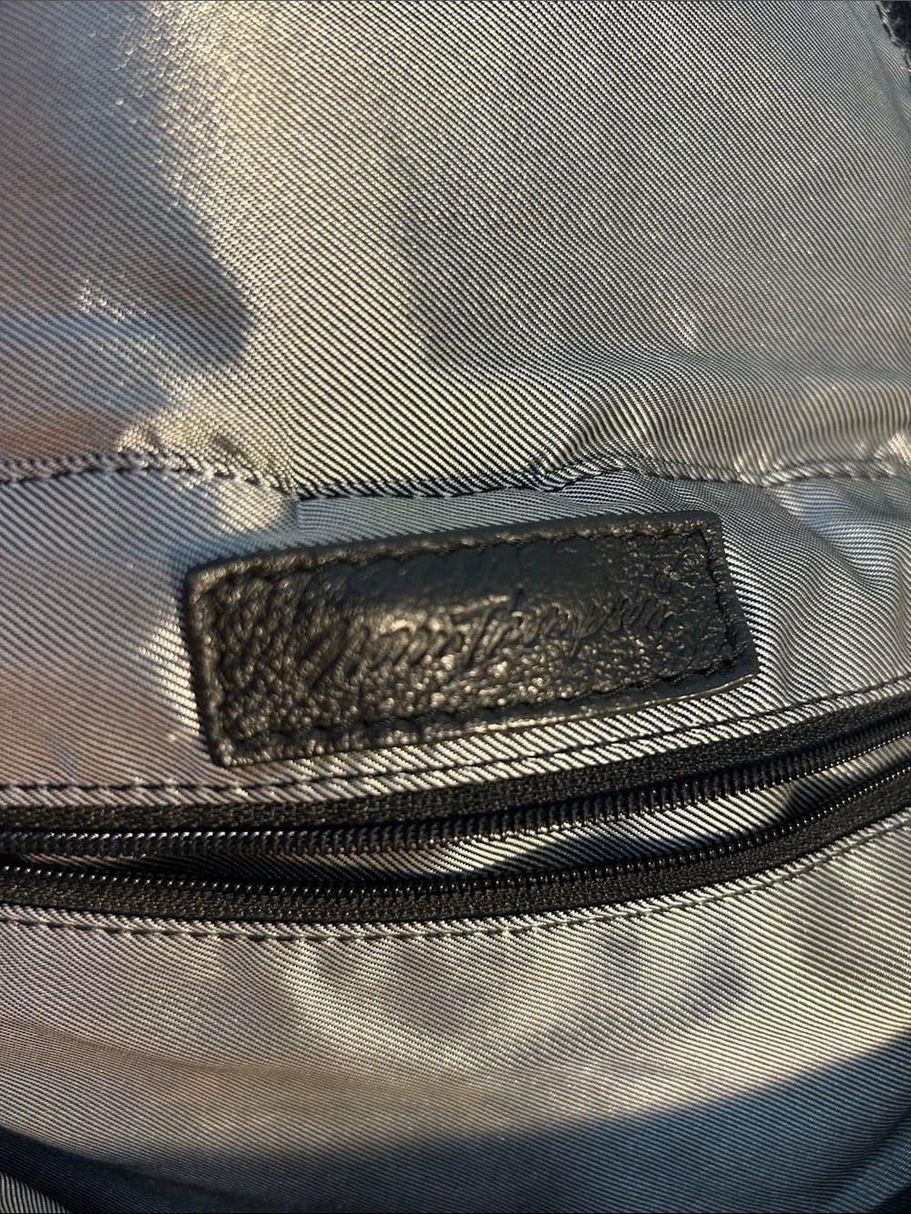 Black Leather Norm Thompson Backpack with 3 front Pockets